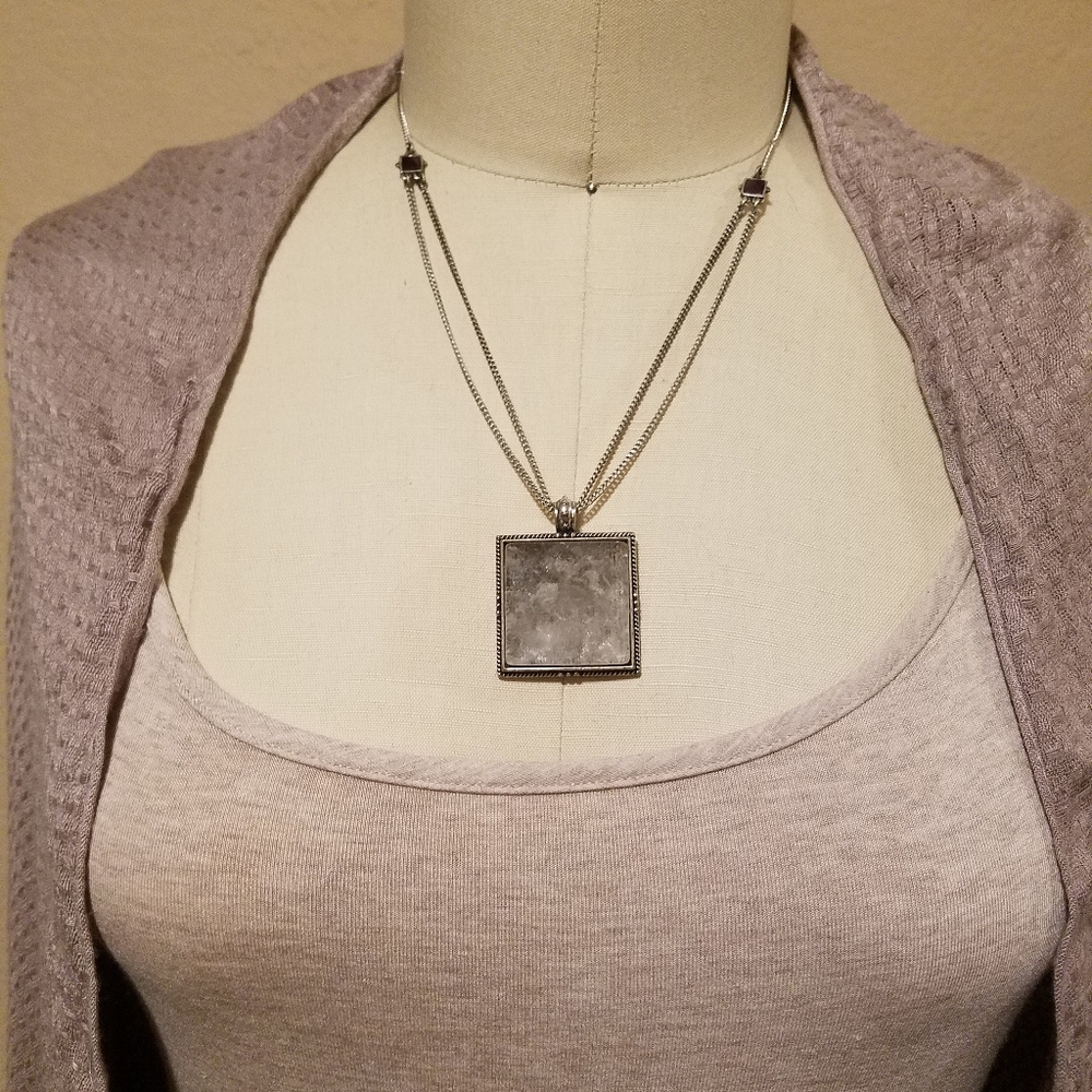 Lucky Brand Genuine Quartz Crystal pendant on silver toned chain.